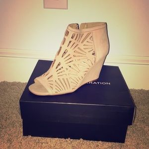 Peep toe wedge booties